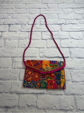 NWT Tiara Multicolor Embroidered Floral Clutch with Pink Beaded Strap. Boho.